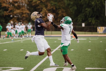 Top: Coach Healey shares a tight connection with his players. Bottom: Brandon Washington catches a long pass before scoring a Gallaudet touchdown against Greensboro.