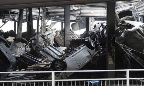 The scene at Luton airport after a fire ripped through level three of the Terminal Car Park 2, causing it to collapse.