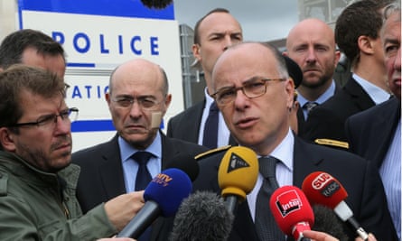 French interior Bernard Cazeneuve at the police station where the murdered officer worked.