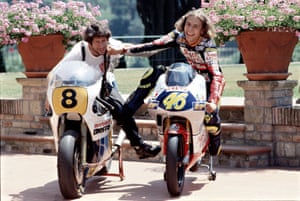 The 18-year-old Rossi jokes with his father Graziano after winning the 125cc Championship in 1997. Graziano, a former Grand Prix motorcycle racer, is pictured on his Morbidelli 500cc bike.