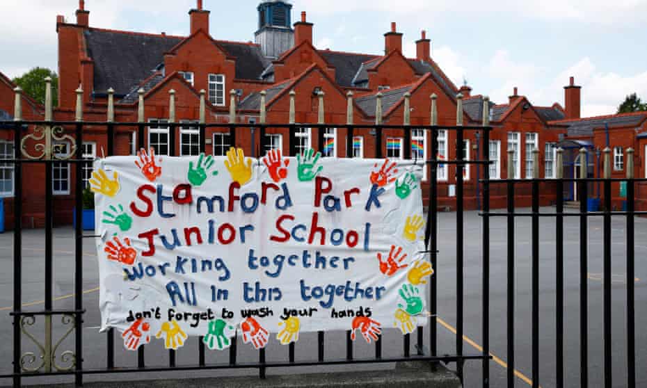 A banner painted by children on the railings of Stamford Park junior school, Altrincham.