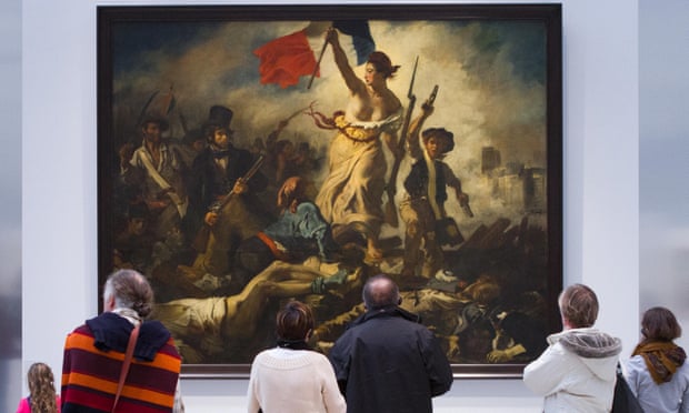 People look at Eugène Delacroix’s painting Liberty leading the people