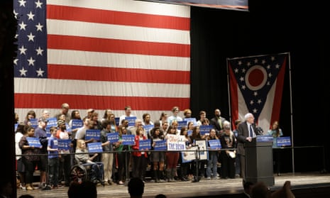 Sanders in Akron, sharing a secret.