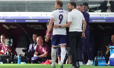 Gareth Southgate with Harry Kane after substituting him in the game against Denmark