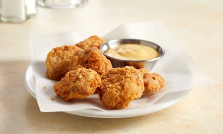 a plate of just, inc’s cultured chicken nuggets