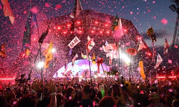 Ticker tape fills the air as the Pyramid Stage crowd listen to Coldplay perform during day four of Glastonbury Festival 2024 at Worthy Farm, Pilton, England.