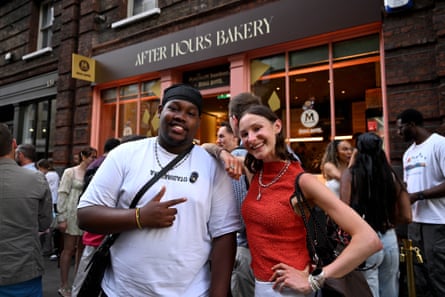 Moses Combe with fellow influencer Florrie Tyler outside a bakery in east London.