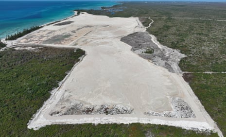 A huge construction site cleared in greenery by a Caribbean sea