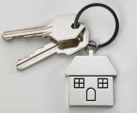 House keys on a house shaped key ring