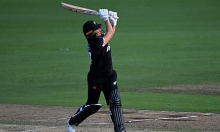 Sophie Devine hits one of four sixes during her unbeaten century.