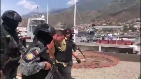 Footage shows Venezuelan arrest of 'mercenary' in alleged US incursion – video