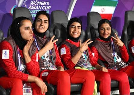 Iran team captain Zahra Ghanbari (second left), Mona Hamoudi (second right) and Atefeh Ramazanzadeh (right) on the bench during their match against the Philippines on Sunday.