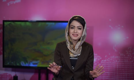 An Afghan presenter records her morning programme on the all-female network Zan TV in Kabul.