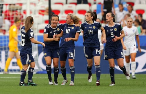 Claire Emslie of Scotland celebrates with team-mates after scoring.