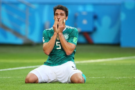 Mats Hummels on his knees after Germany loose 2-0 to South Korea and are out of the World Cup.