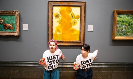 Just Stop Oil protesters throw tomato soup at Vincent Van Gogh’s 1888 painting Sunflowers at the National Gallery in London on 14 October.
