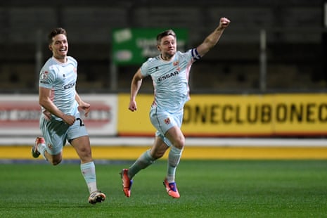 Sam Finley (right) celebrates after giving Tranmere Rovers the lead at Newport County.
