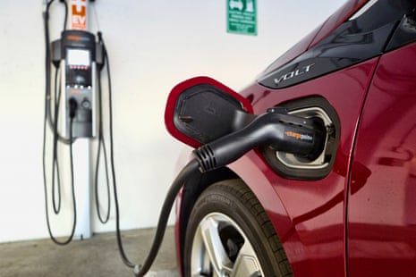 an electric vehicle charges