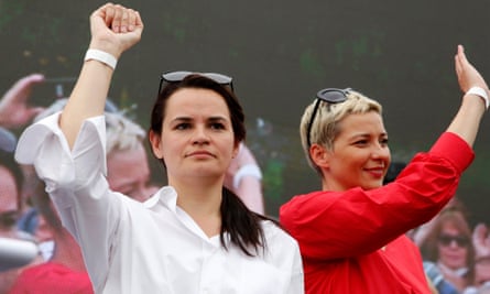Svetlana Tikhanovskaya, left, with Maria Kolesnikova, a representative of an unofficial candidate Victor Babariko in Minsk on 19 July.