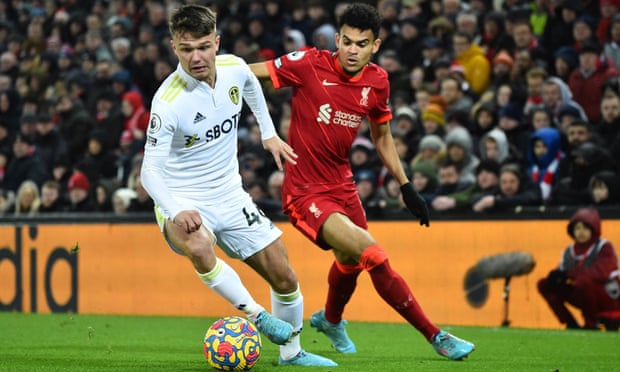 Jamie Shackleton (left), in action for Leeds against Liverpool last February, has gone on loan to the Championship club Millwall for the 2022-23 season.