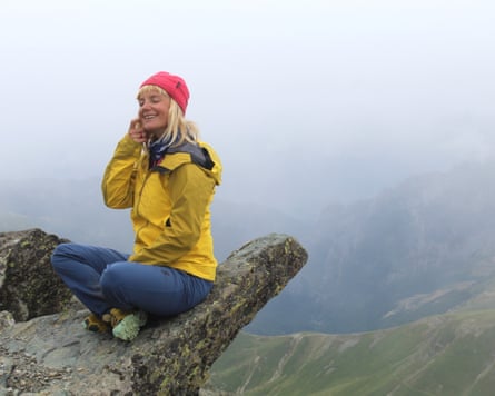 The mountaineer and guide Uta Ibrahimi on the summit of Gjeravica.