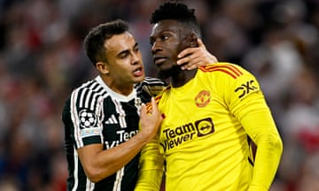 Manchester United's Sergio Reguilón consoles André Onana after the goalkeeper’s error allowed Bayern Munich to open the scoring