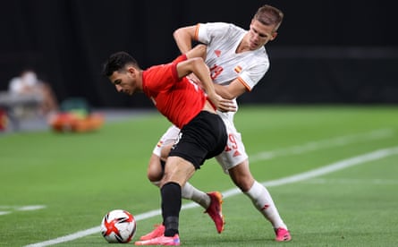 Dani Olmo, another of the Spain Euro 2020 squad playing at the Olympics, battles with Ahmed Fotouh.