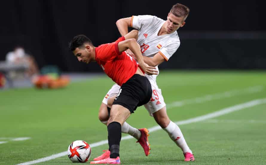 Dani Olmo, another of the Spain Euro 2020 squad playing at the Olympics, battles with Ahmed Fotouh.