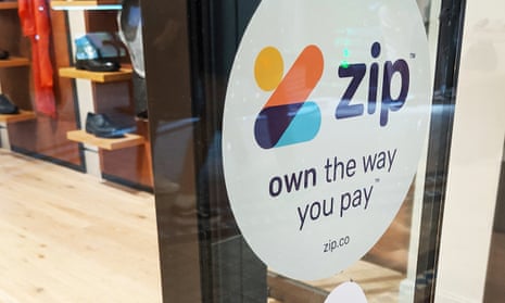  Zip signage is seen on a storefront in Sydney