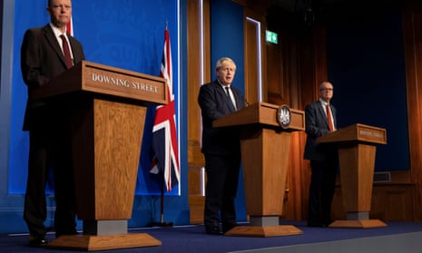 Chief medical officer for England Chris Whitty, Boris Johnson and chief scientific adviser Patrick Vallance at Tuesday's press conference.
