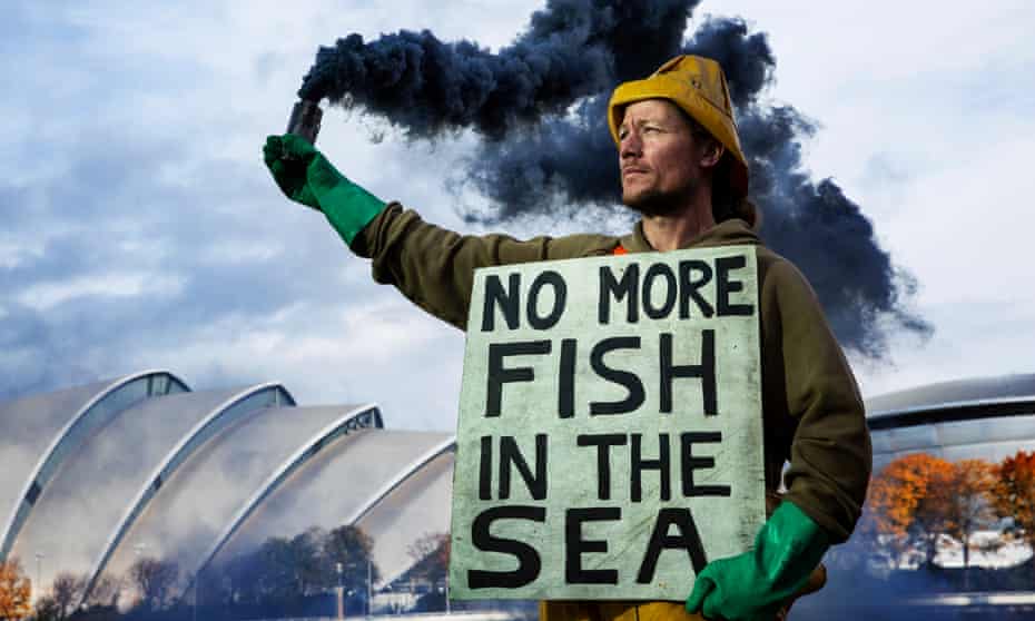 An Extinction Rebellion demonstrator protests against bottom trawling