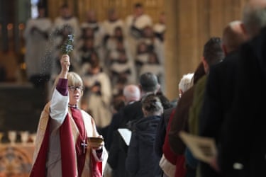 Sarah Mullally sprinkles holy water