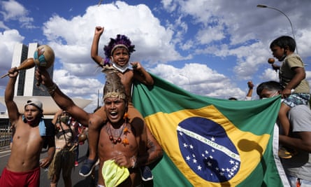 Indigenous protesters shout ‘Bolsonaro get out!,’ during a march to the supreme court in Brasilia, Brazil, on 1 September 2021, before a ruling on land rights.