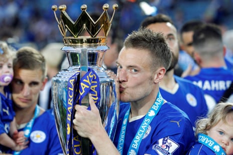 Jamie Vardy and the Premier League trophy.