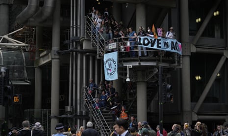 Extinction Rebellion climate change protesters demostrating at the Lloyds of London insurance company building.