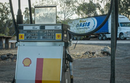 The truck parked behind a diesel fuel pump