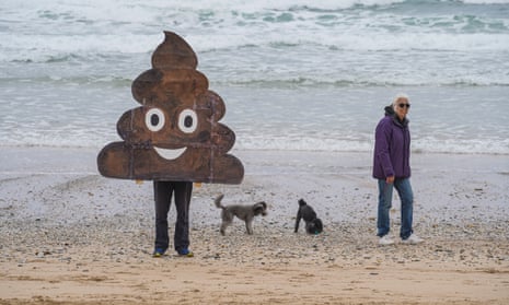 Dog walker and anti-sewage protester dressed as a poo