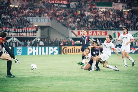 Patrick Kluivert scores the match-winning goal despite the efforts of Milan’s Alessandro Costacurta and Franco Baresi