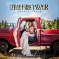 The artwork for Little Miss Twain depicting Shania Twain at the wheel of a red truck