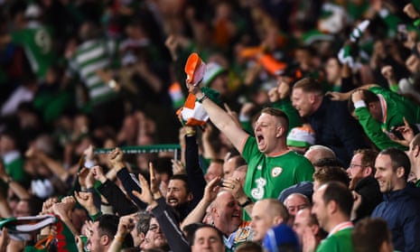 Republic of Ireland supporters celebrate after James McClean fired their team ahead in Cardiff.