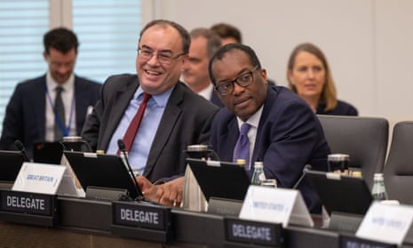 Bank of England governor Andrew Bailey shares a moment chancellor Kwasi Kwarteng before a meeting of G7 finance ministers  at the IMF in Washington.