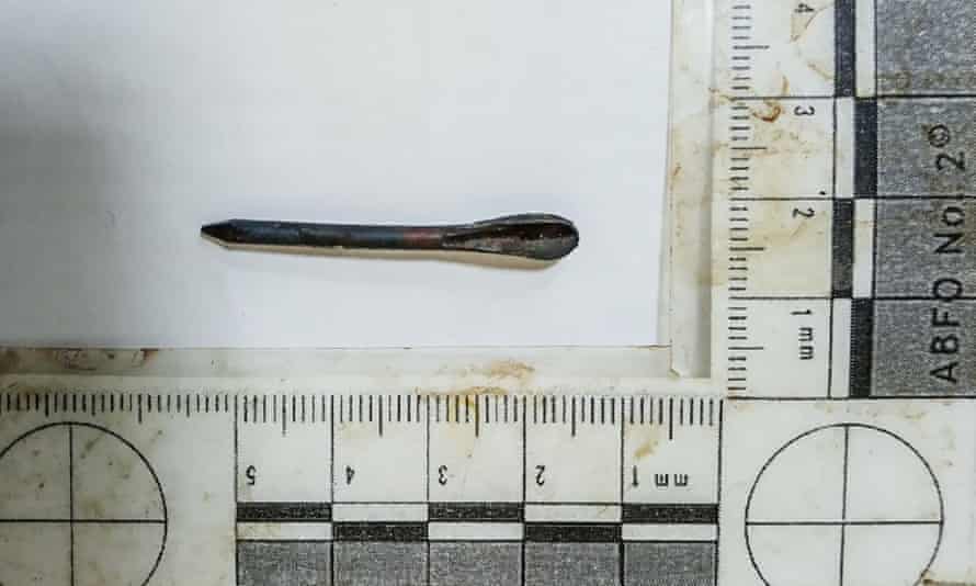 A small metal dart, called a fléchette, embedded in the body of man killed in Bucha, where Russian occupiers have been accused of atrocities against residents. Courtesy of Kyiv’s forensic department.