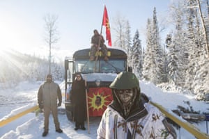 Camp supporters wait for police at the Gidimt’en blockade near Houston, British Columbia on Monday, January 7, 2019. Police were enforcing an injunction for the Coastal GasLink Pipeline. Fourteen people were arrested.