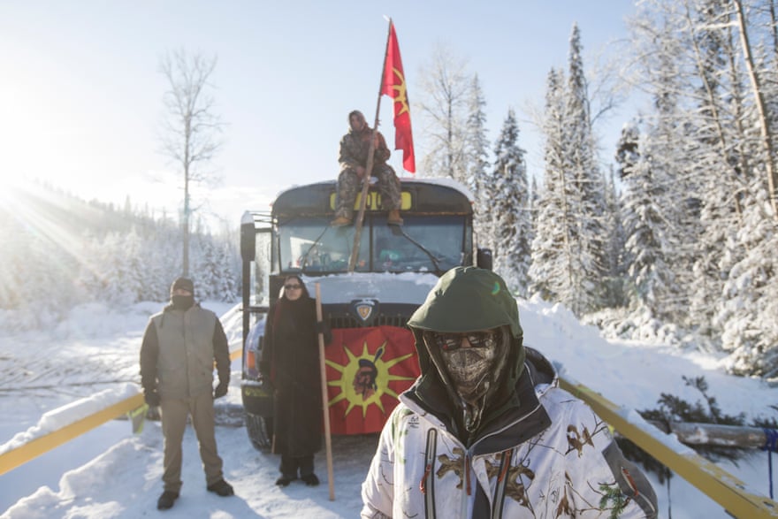 Camp supporters wait for police at the Gidimt’en blockade near Houston, British Columbia.