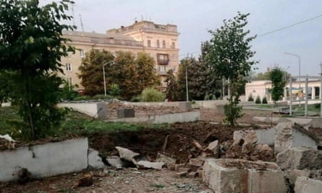 Damage due to a Russian military strike in a location given as Marhanets town.