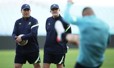 René Meulensteen and Graham Arnold on the training pitch with Australia in 2021.