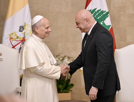 Pope Leo is greeted by the Lebanese president, Joseph Aoun, as he arrives at the presidential palace in Beirut, Lebanon