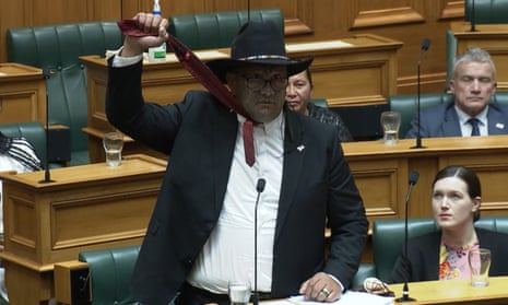 Co-leader of New Zealand’s Māori party Rawiri Waititi simulating a noose during his maiden speech in Wellington. 