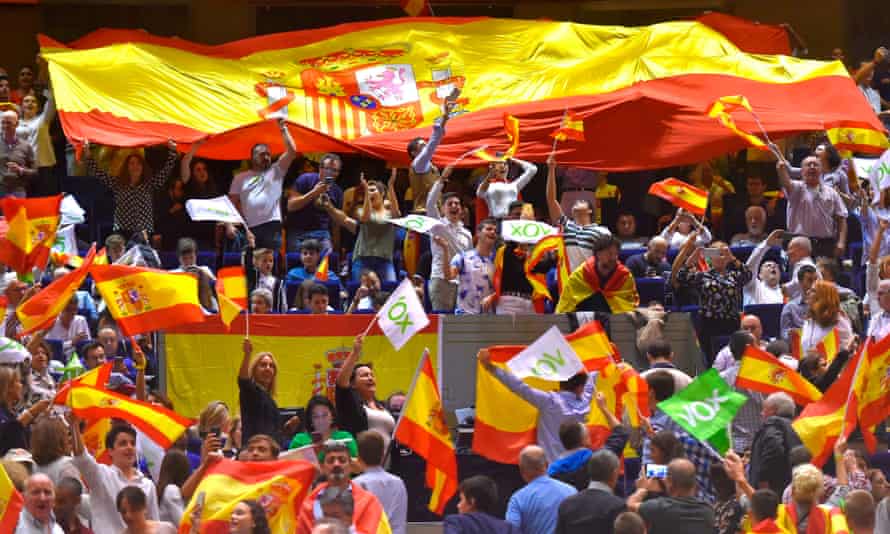 Spanish far-right Vox supporters wave Spanish flags during a campaign rally in Santander. Vox has seen a surge of support.
