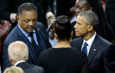 From left, Vice President Joe Biden, Rev. Jesse Jackson, first lady Michelle Obama, and President Barack Obama gather after services honoring the life of Reverend Clementa Pinckney at the College of Charleston TD Arena in Charleston, S.C., on June 26, 2015.